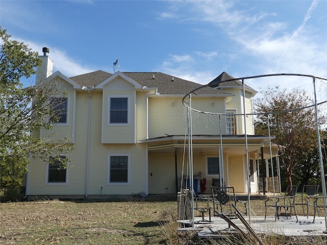 back of house with a patio area