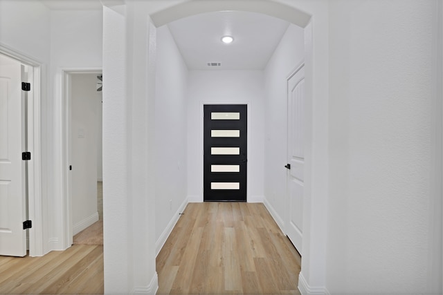 doorway to outside featuring light wood-type flooring