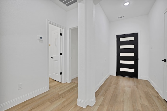 foyer featuring light hardwood / wood-style floors