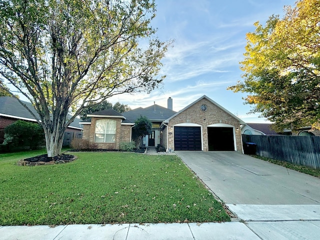 single story home featuring a garage and a front yard