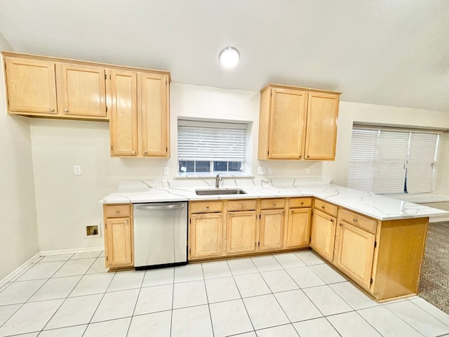 kitchen featuring kitchen peninsula, dishwasher, light brown cabinetry, and sink