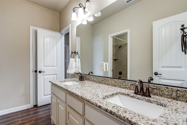 bathroom featuring vanity and walk in shower