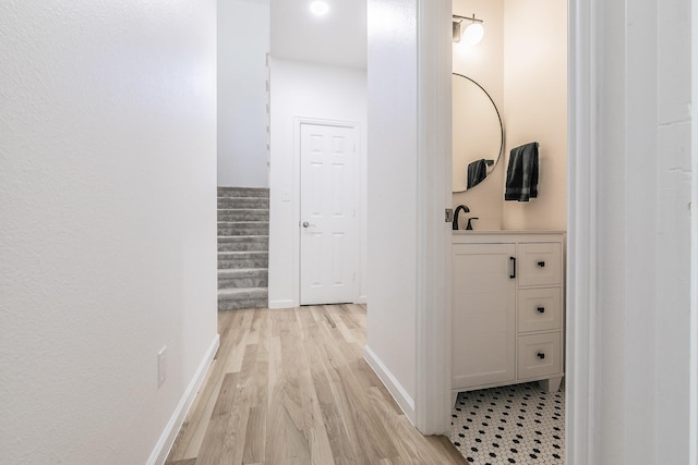 corridor featuring light hardwood / wood-style flooring