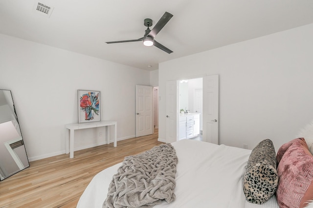 bedroom with wood-type flooring and ceiling fan