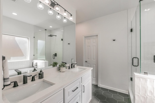 bathroom with tile patterned floors, shower with separate bathtub, and vanity