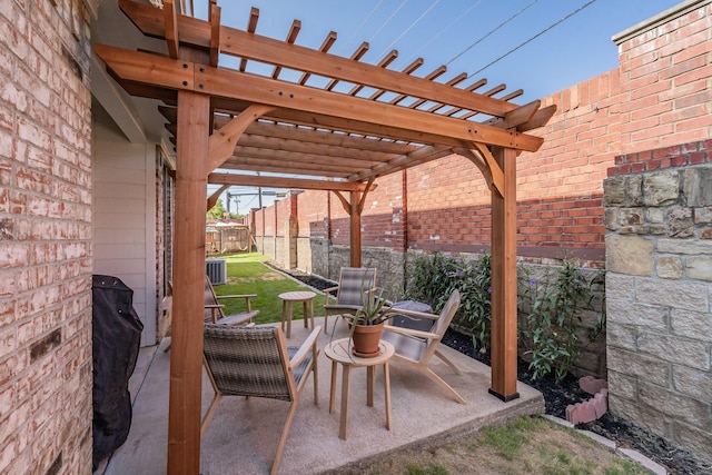 view of patio / terrace with a pergola and central air condition unit