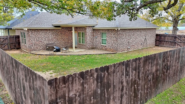 back of house with a patio area