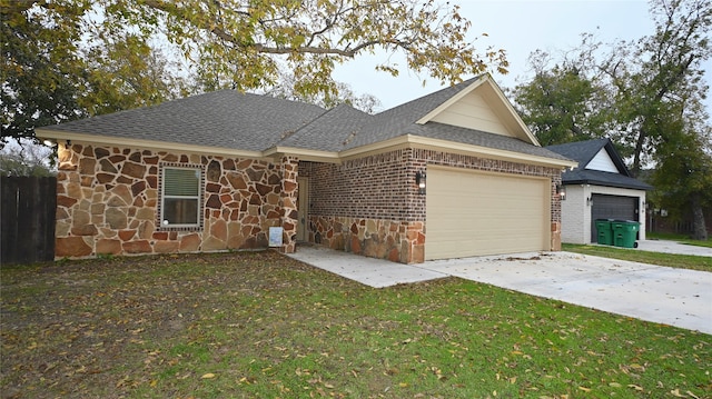 ranch-style house with a front yard and a garage