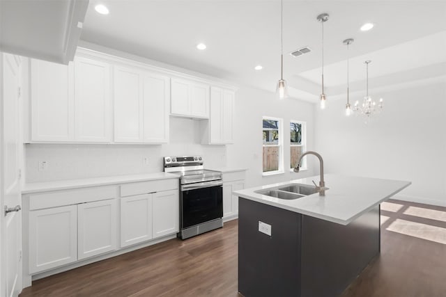 kitchen with white cabinetry, sink, and stainless steel range with electric stovetop