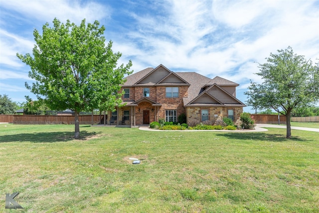 118 Prairie Creek Way, Abilene, TX 79602 - craftsman-style house featuring covered porch, stone siding, and brick siding