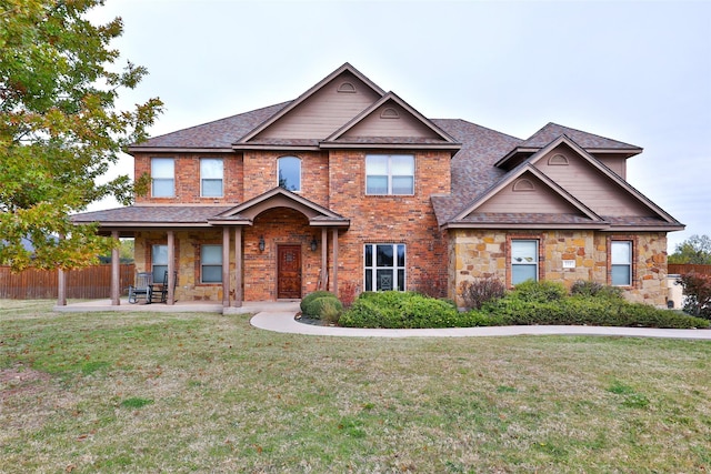 craftsman-style home with a front lawn