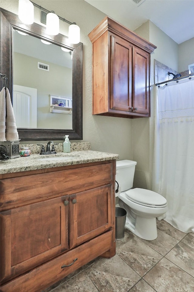 118 Prairie Creek Way, Abilene, TX 79602 - bathroom with vanity, toilet, and curtained shower
