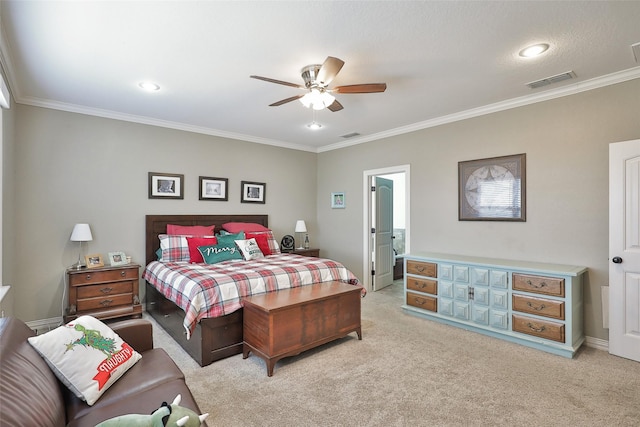 carpeted bedroom featuring ceiling fan and ornamental molding