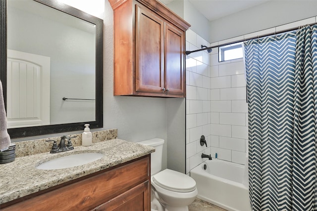 full bathroom featuring shower / tub combo, vanity, and toilet