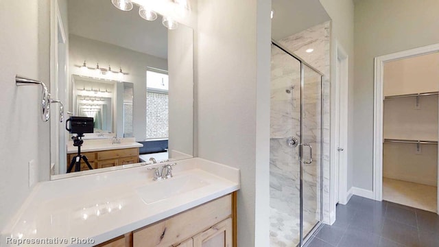 bathroom featuring vanity and walk in shower