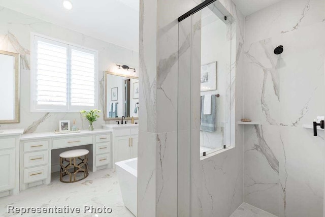 bathroom with vanity and separate shower and tub