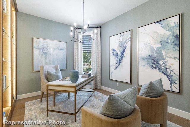 office area featuring a chandelier and hardwood / wood-style flooring