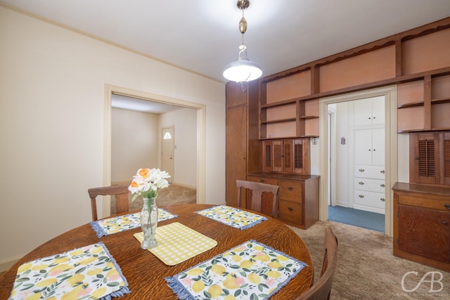 view of carpeted dining space