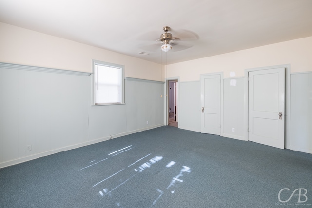 unfurnished bedroom featuring carpet floors and ceiling fan