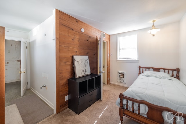 bedroom featuring carpet flooring and heating unit