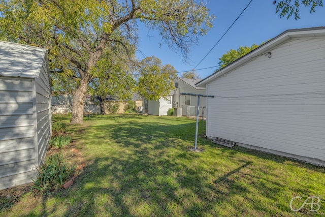 view of yard featuring central AC unit