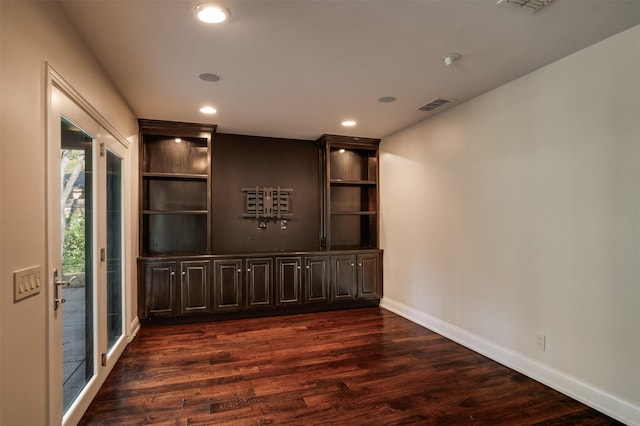 2516 Beefeater Dr, Wichita Falls, TX 76308 - unfurnished room with dark wood-style floors and recessed lighting