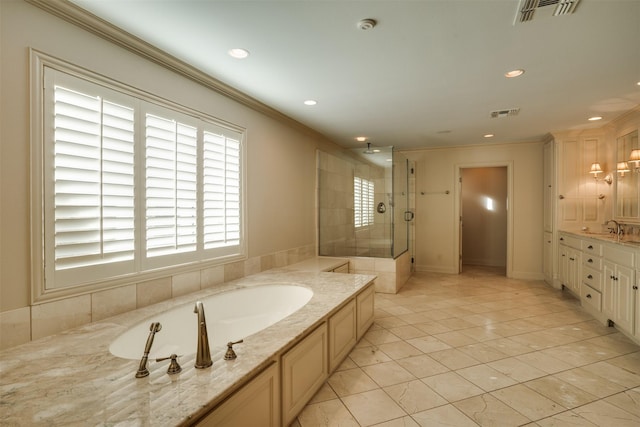 2516 Beefeater Dr, Wichita Falls, TX 76308 - bathroom featuring a shower stall, a bath, recessed lighting, ornamental molding, and vanity
