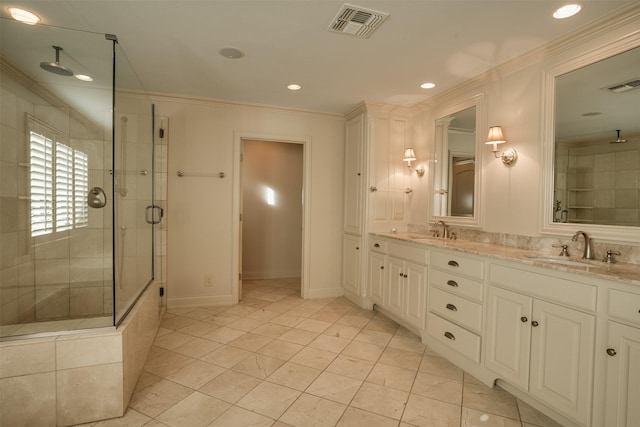 2516 Beefeater Dr, Wichita Falls, TX 76308 - bathroom featuring a stall shower, crown molding, double vanity, and recessed lighting