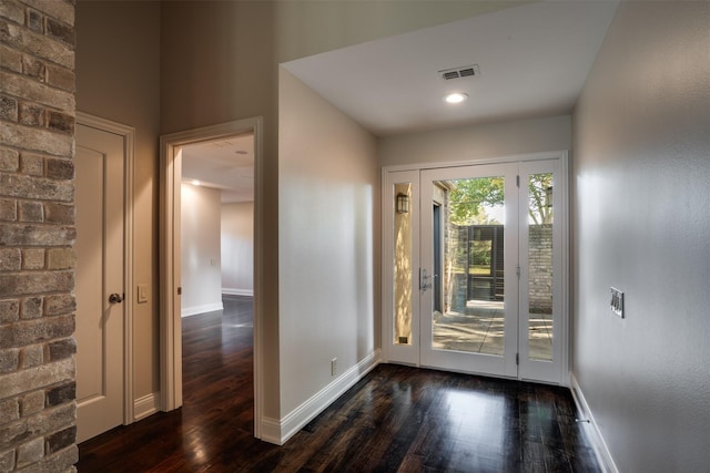 2516 Beefeater Dr, Wichita Falls, TX 76308 - foyer entrance with dark wood finished floors and baseboards