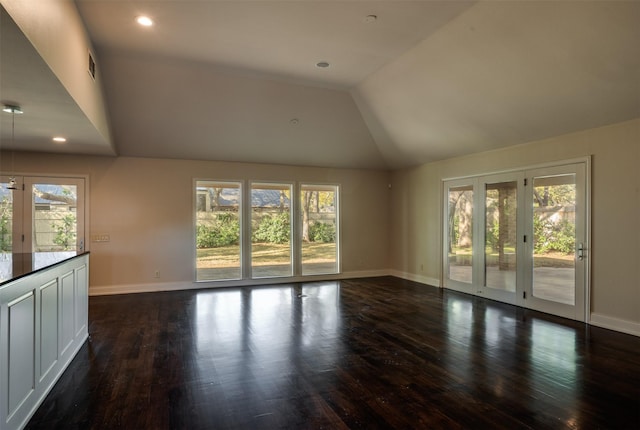 2516 Beefeater Dr, Wichita Falls, TX 76308 - unfurnished room featuring dark wood finished floors, lofted ceiling, and recessed lighting