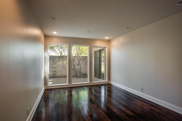 2516 Beefeater Dr, Wichita Falls, TX 76308 - unfurnished room featuring dark wood finished floors and recessed lighting