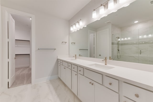 bathroom with vanity and walk in shower