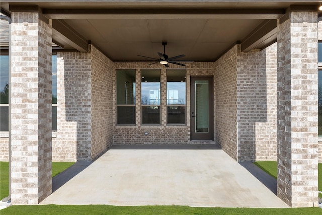 view of patio featuring ceiling fan