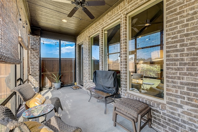 view of patio / terrace featuring area for grilling and ceiling fan