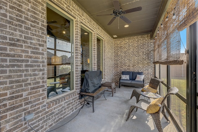 view of patio / terrace featuring ceiling fan