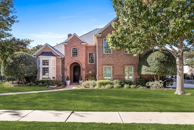 view of front of home with a front yard