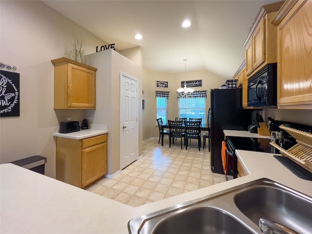 kitchen with sink, pendant lighting, electric range, a notable chandelier, and lofted ceiling