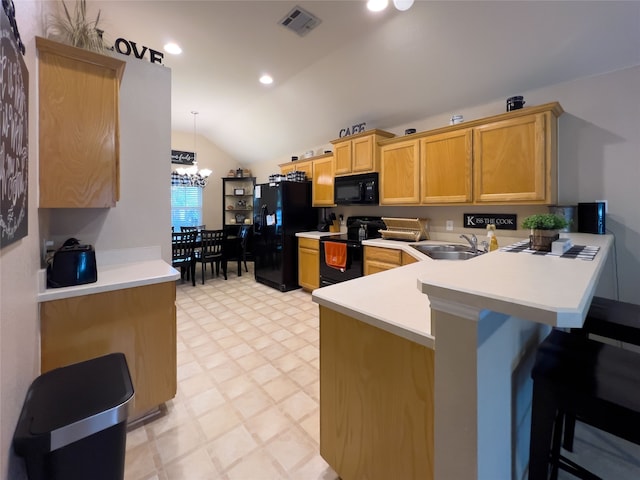 kitchen with kitchen peninsula, vaulted ceiling, sink, black appliances, and hanging light fixtures