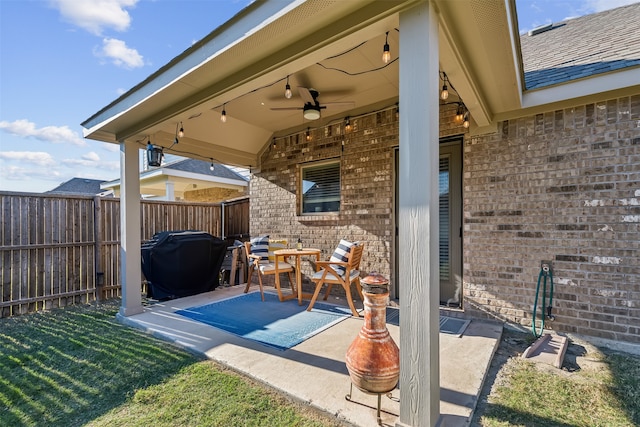 view of patio featuring grilling area and ceiling fan