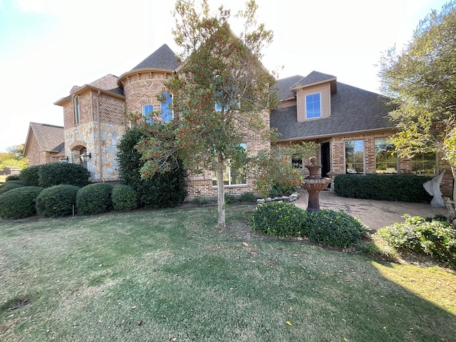 view of front of house with a front yard