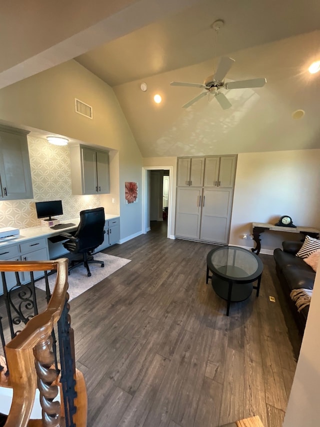 office space with dark hardwood / wood-style floors, vaulted ceiling, and ceiling fan