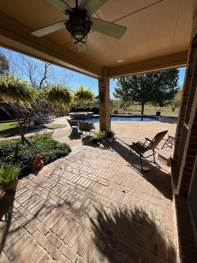 view of patio with ceiling fan