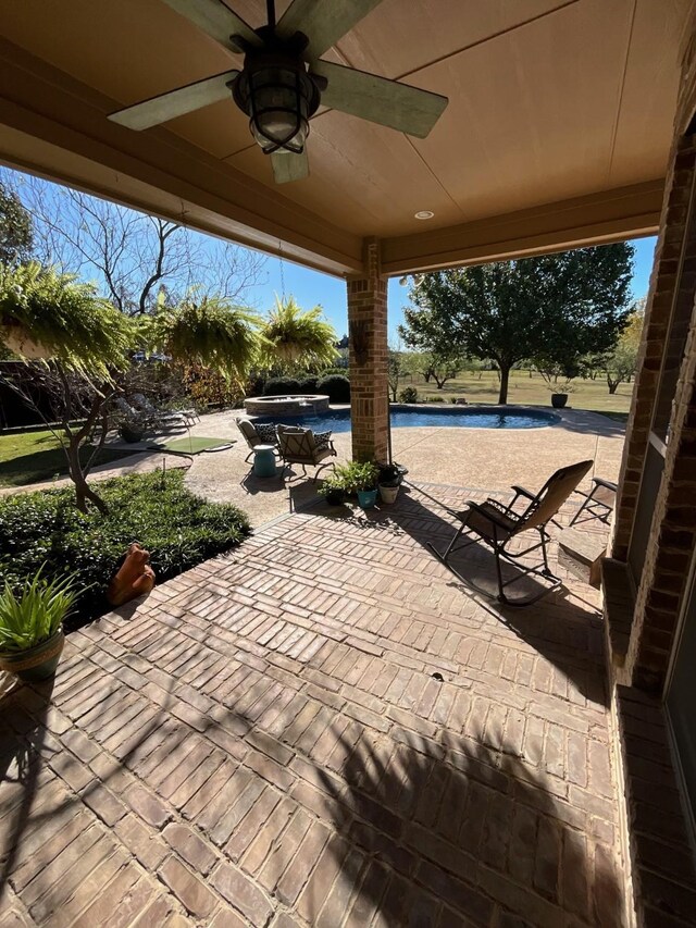 view of patio with ceiling fan