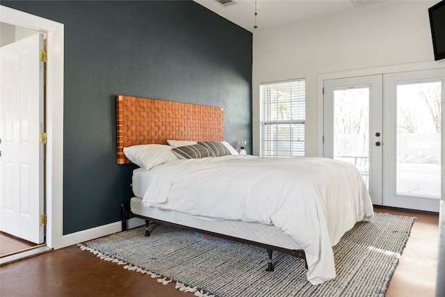 bedroom with access to outside and french doors