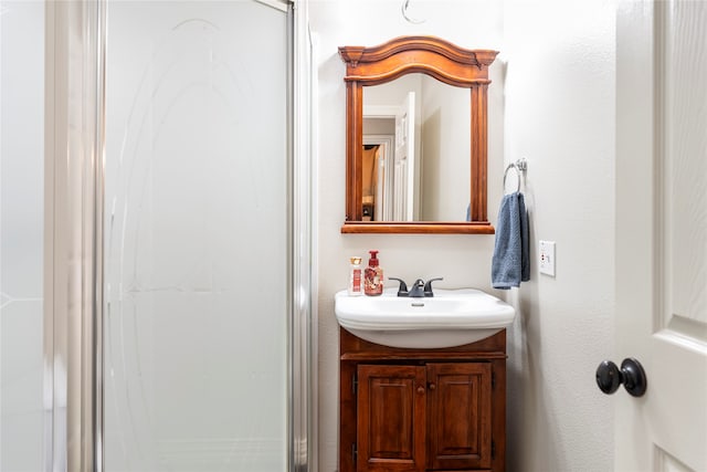 bathroom featuring vanity and walk in shower