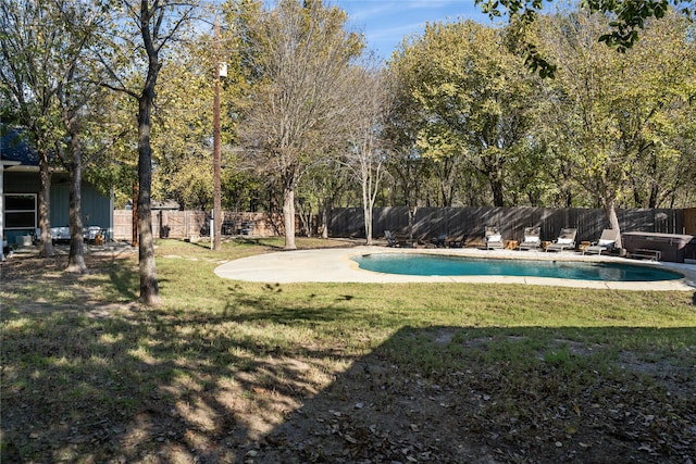 view of yard featuring a patio and a fenced in pool