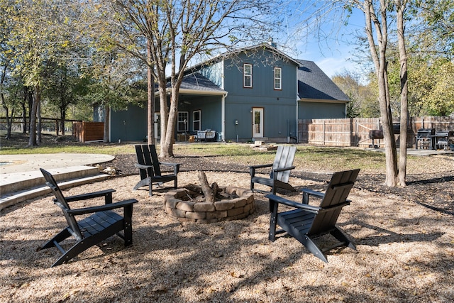 exterior space with a fire pit