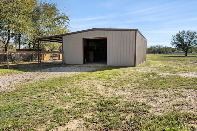 view of outdoor structure featuring a yard