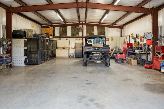 garage with a workshop area