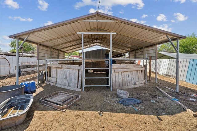 view of patio / terrace featuring an outbuilding